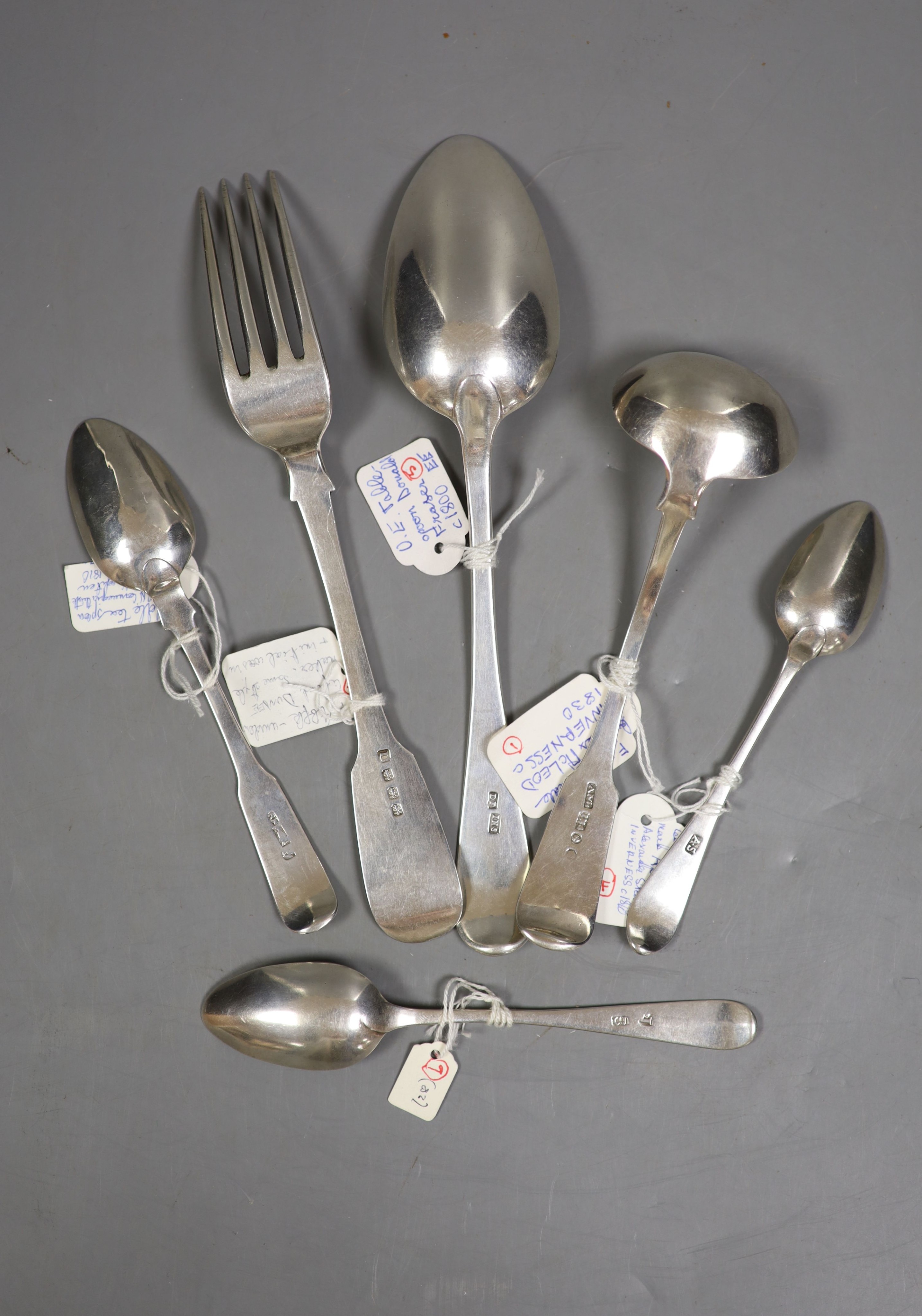 A 19th century Scottish provincial silver Old English pattern tablespoon, Donald Fraser, Inverness, c.1800, 21.3cm, a similar fiddle pattern toddy ladle, Alex McLeod and three similar teaspoons, probably Robert Naughton,